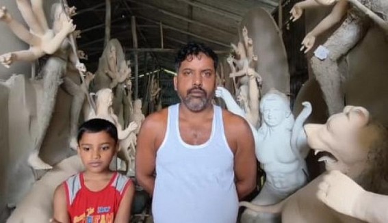 Young Debjit Joins Father in Crafting Durga Idols Young Debjit Joins Father in Crafting Durga Idols